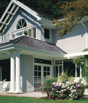 House with decorative siding in Marlborough, MA.
