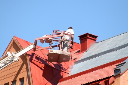 Roof painting in West Concord, Massachusetts by Torres Construction & Painting, Inc.