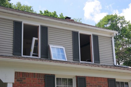 Vinyl window replacements. House getting new vinyl windows.